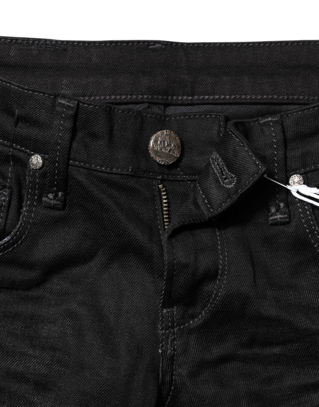 Eight pairs of black low-rise slim-fit cotton denim jeans