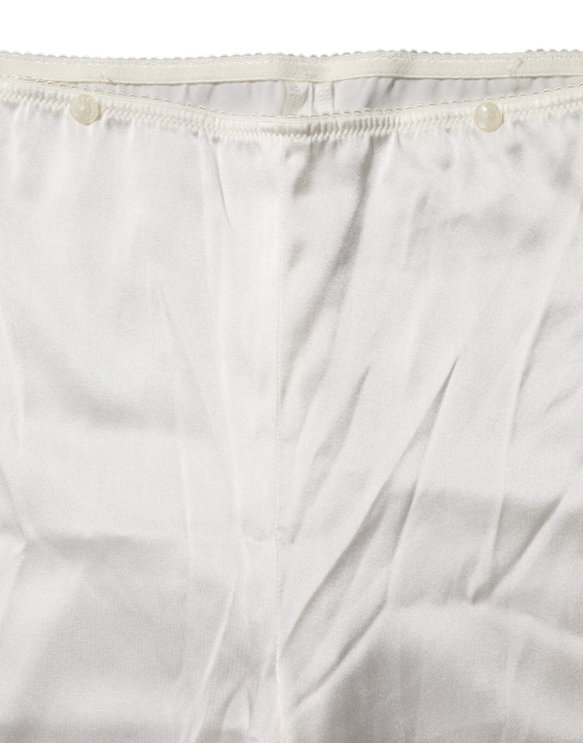 Dolce & Gabbana Elfenbeinfarbene konisch zulaufende Seidenhose mit hoher Taille