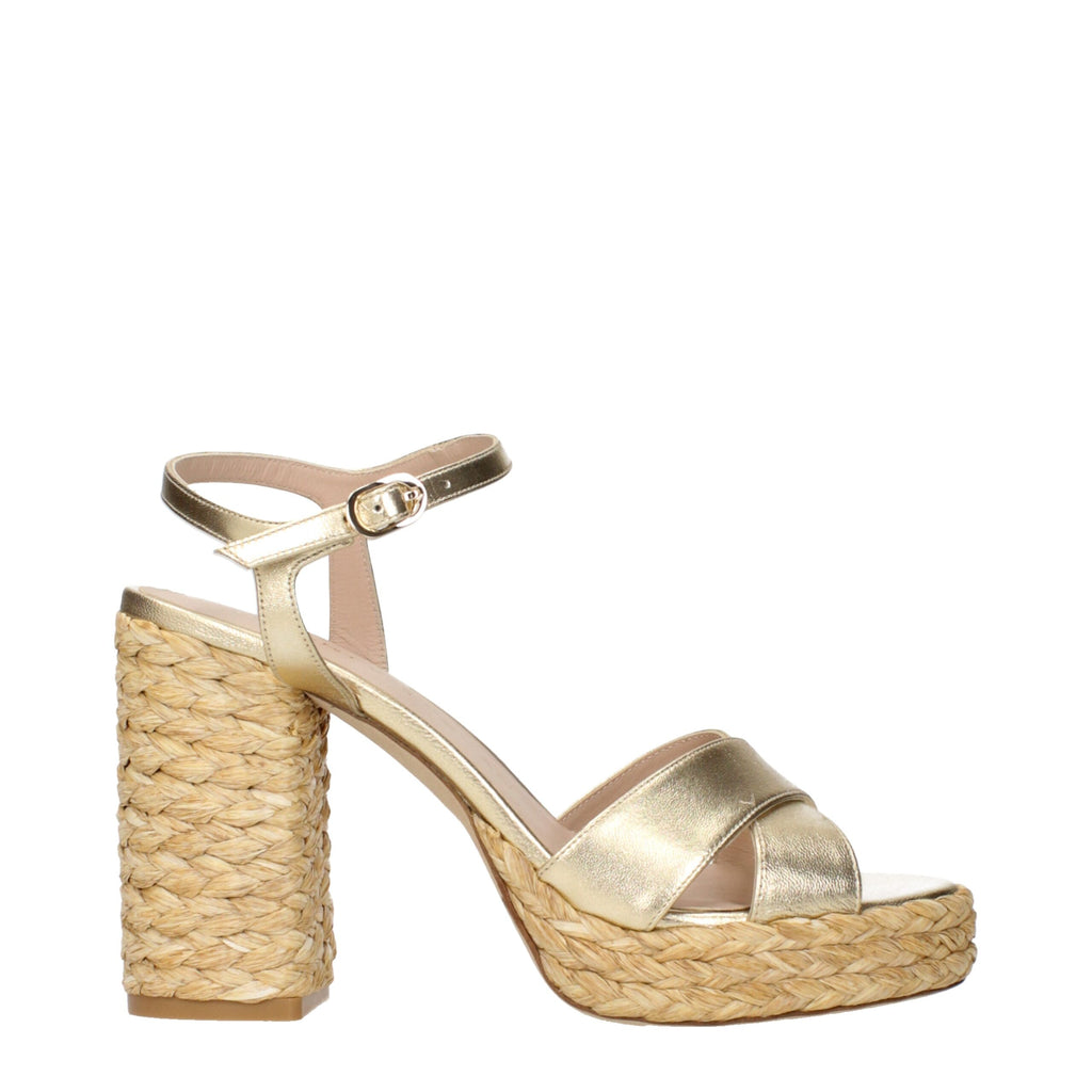 Stuart Weitzman Goldene Ledersandalen mit Plateauabsatz