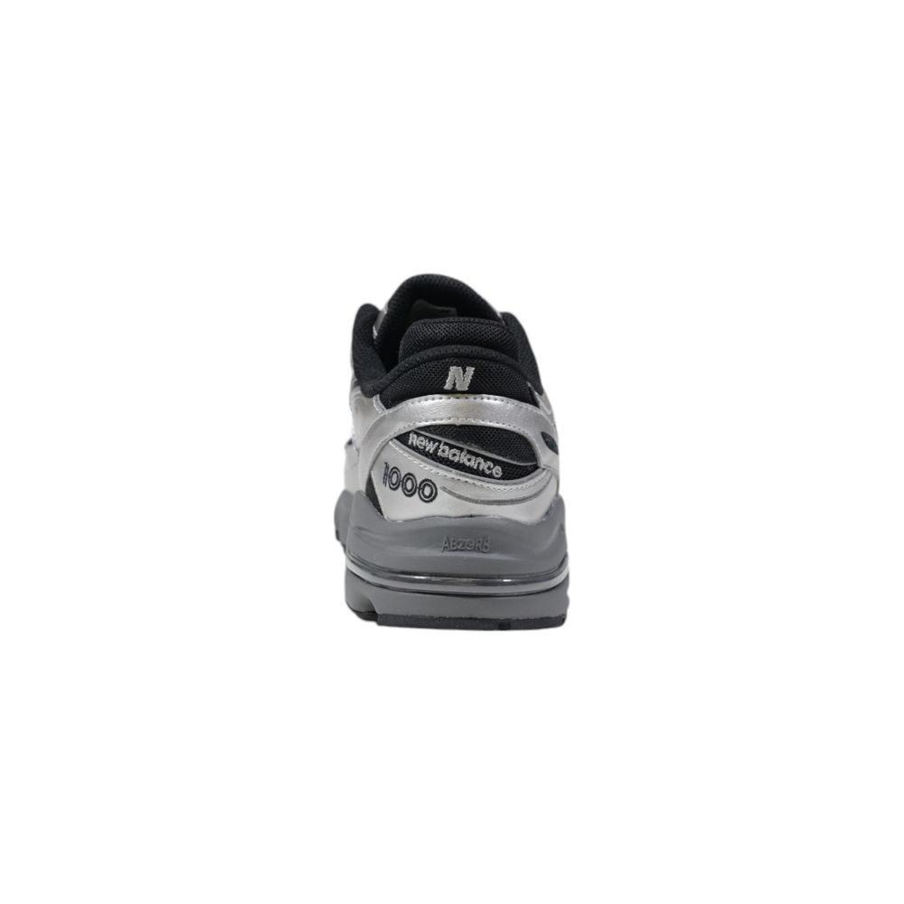 New Balance Silberne Synthetik-Sportschuhe